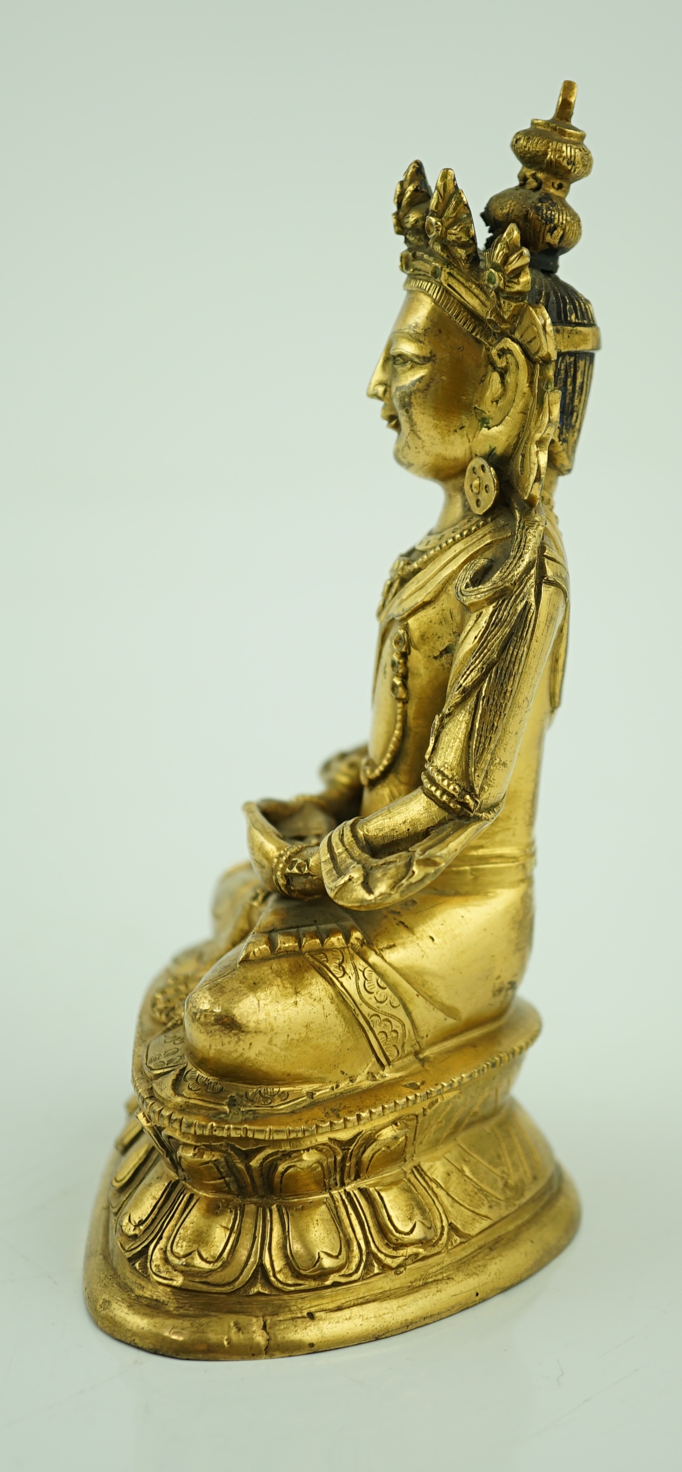 A Tibetan gilt bronze figure of Avalokeshvara, 18th century